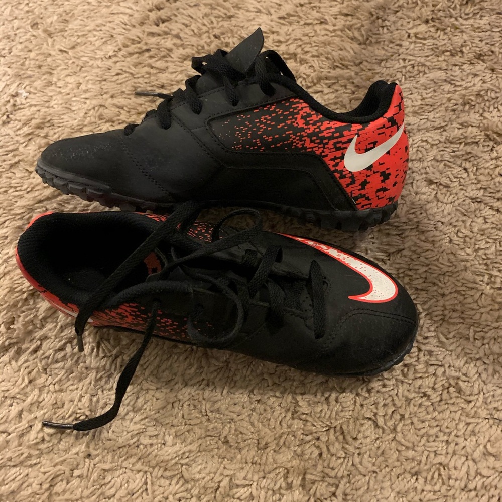 Gently worn Nike Kids' BombaX Turf Soccer Shoes